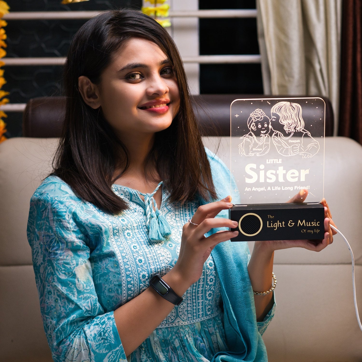 girl holding gift lamp